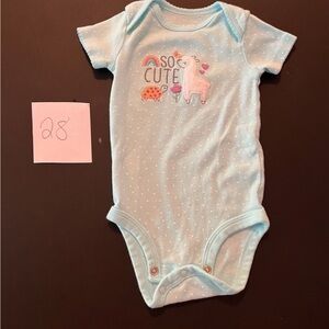 0-3M onesie by Carter’s